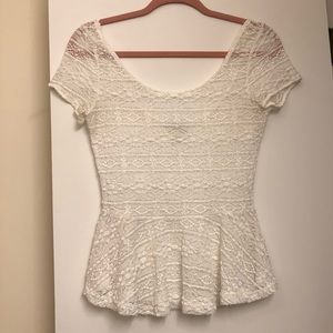 Delia’s white lace peplum top